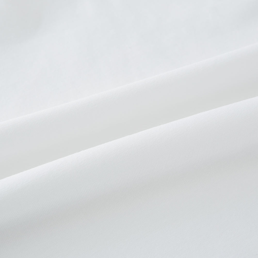 The Turnbull & Asser White Short-sleeve Pyjama Shirt is shown laid flat on a white background, featuring a plain, logo-free design for effortless comfort and classic loungewear style.
