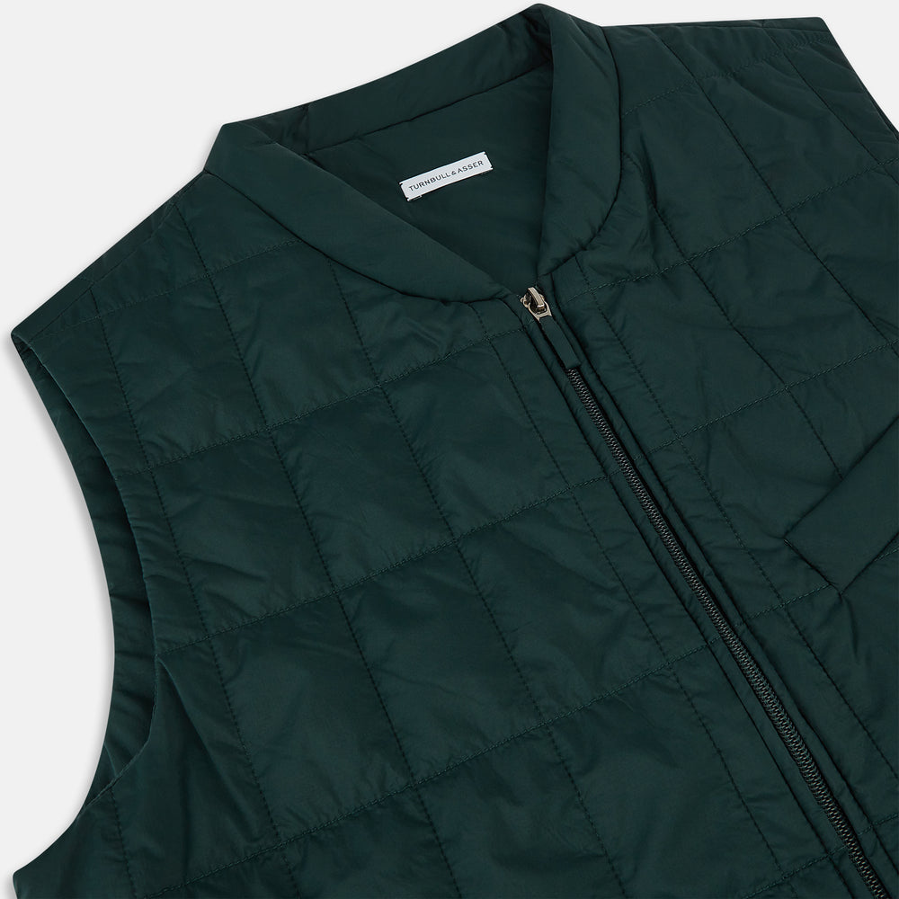 QUILTED VEST ZIP PKTS,BACK WAIST STRAPS FOREST GRN