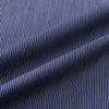View 5 of product The Navy Stripe Highbury Overshirt by Turnbull & Asser features thin vertical stripes, black buttons, a collar, and a chest pocket. Displayed on a plain white background, it’s inspired by classic Turnbull & Asser style.