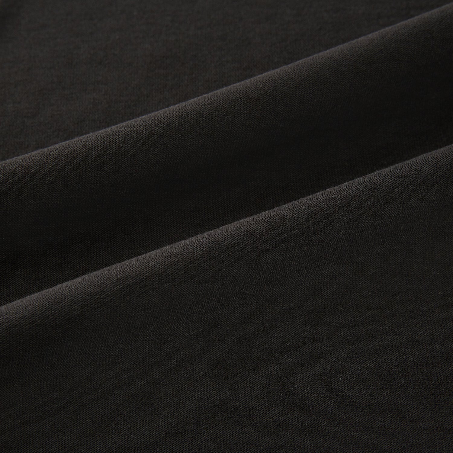 View 6 of product The Turnbull & Asser Dark Chocolate Long-Sleeve T-shirt features a minimalist crew neck design with no visible logos or patterns, shown laid flat on a white background for a versatile, understated look.