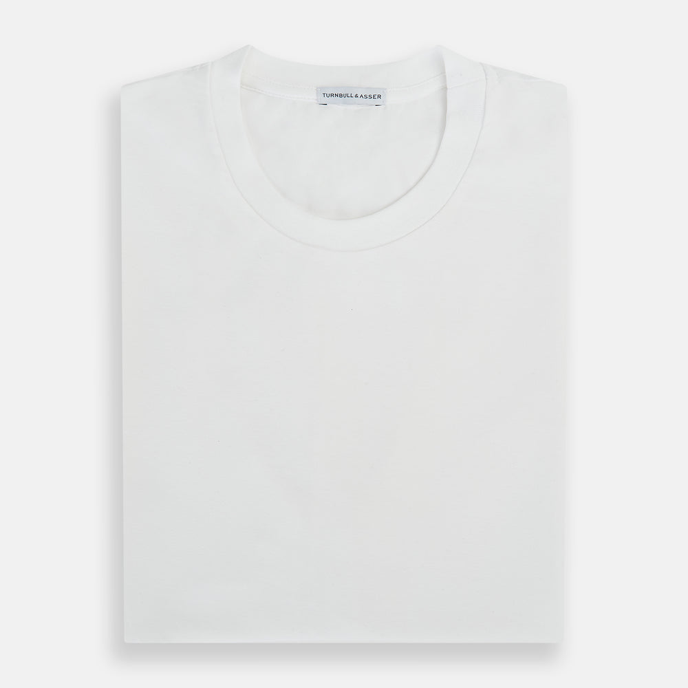The Turnbull & Asser White Short-sleeve Pyjama Shirt is shown laid flat on a white background, featuring a plain, logo-free design for effortless comfort and classic loungewear style.