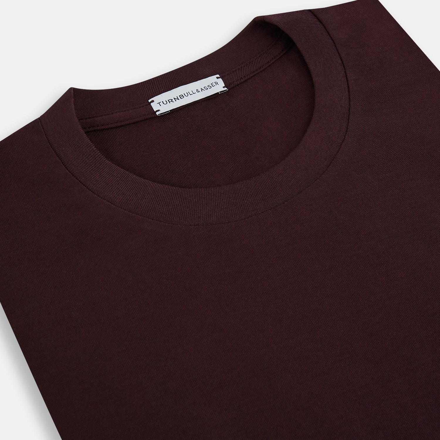 View 2 of product The Turnbull & Asser Burgundy Short-Sleeve T-shirt features a crew neckline and quality fabric, shown on a white background—ideal for versatile everyday wear.