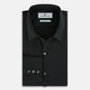 View 5 of product The FOREST GREEN WINDSOR SHIRT by Turnbull & Asser features long sleeves, a Windsor collar, and buttoned cuffs, exemplifying British craftsmanship. Displayed on a plain white background.