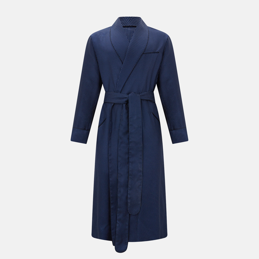 Navy and white polka dot gown with rolled hems in silk