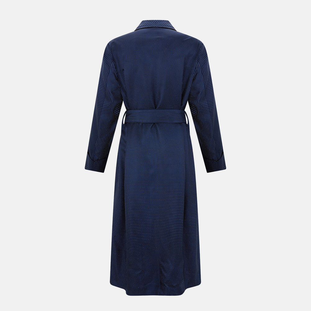 Navy and white polka dot gown with rolled hems in silk