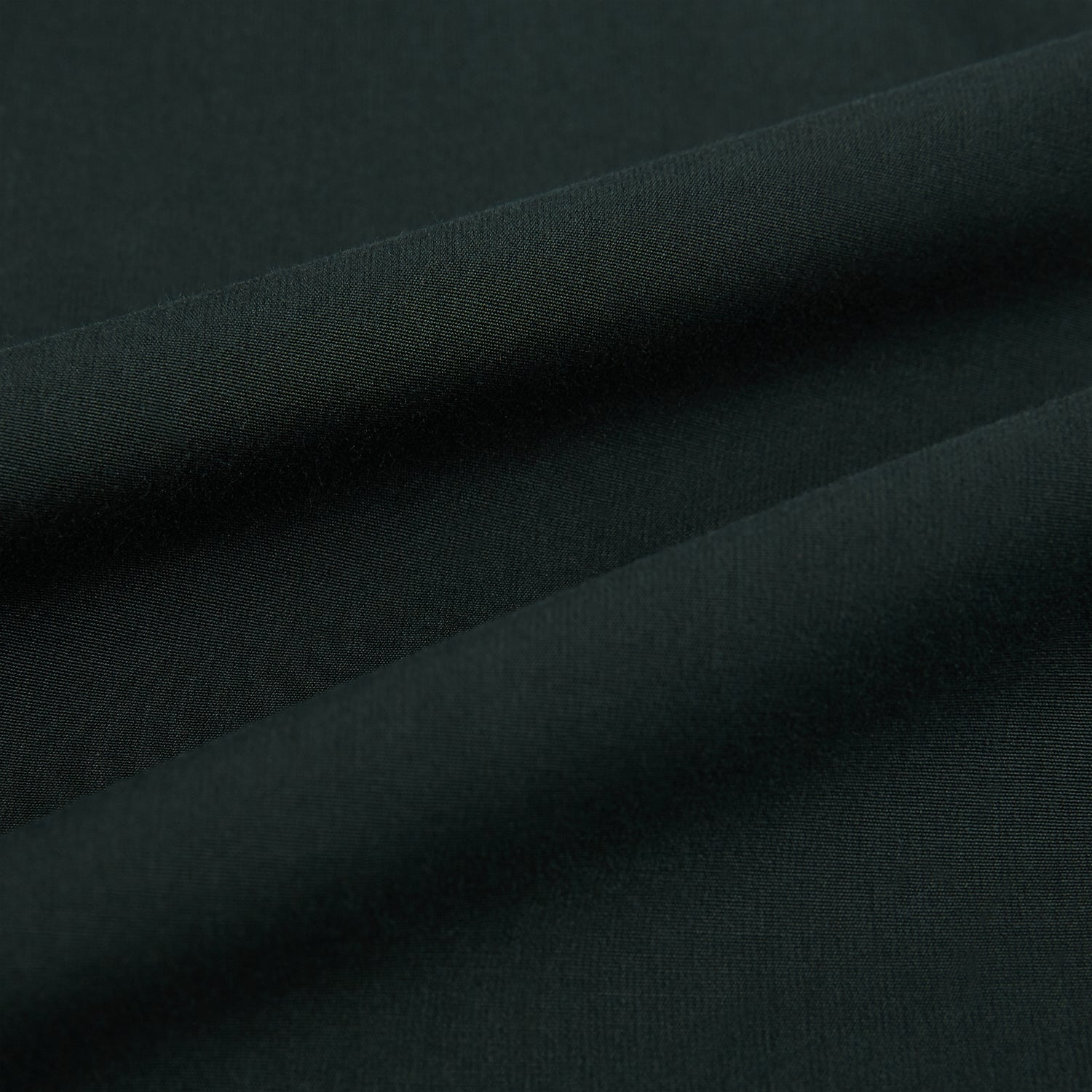 View 8 of product The FOREST GREEN WINDSOR SHIRT by Turnbull & Asser features long sleeves, a Windsor collar, and buttoned cuffs, exemplifying British craftsmanship. Displayed on a plain white background.