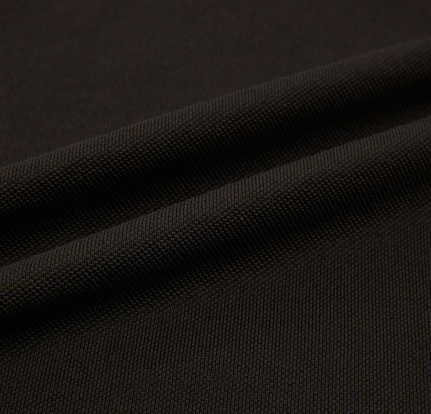 View 5 of product A brown short-sleeve polo shirt by Turnbull & Asser, crafted from pure cotton jersey with a collar, three buttons, and a buttoned chest pocket, laid flat on a white background.