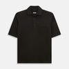 View 1 of product A brown short-sleeve polo shirt by Turnbull & Asser, crafted from pure cotton jersey with a collar, three buttons, and a buttoned chest pocket, laid flat on a white background.