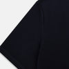 View 4 of product A navy short-sleeve pyjama shirt by Turnbull & Asser is laid flat on a white background, featuring a round neckline and a minimalist design—perfect for relaxed wear.
