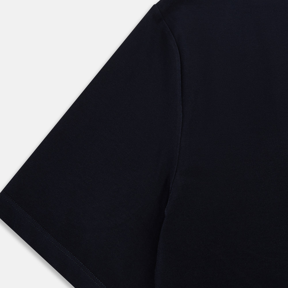 A navy short-sleeve pyjama shirt by Turnbull & Asser is laid flat on a white background, featuring a round neckline and a minimalist design—perfect for relaxed wear.